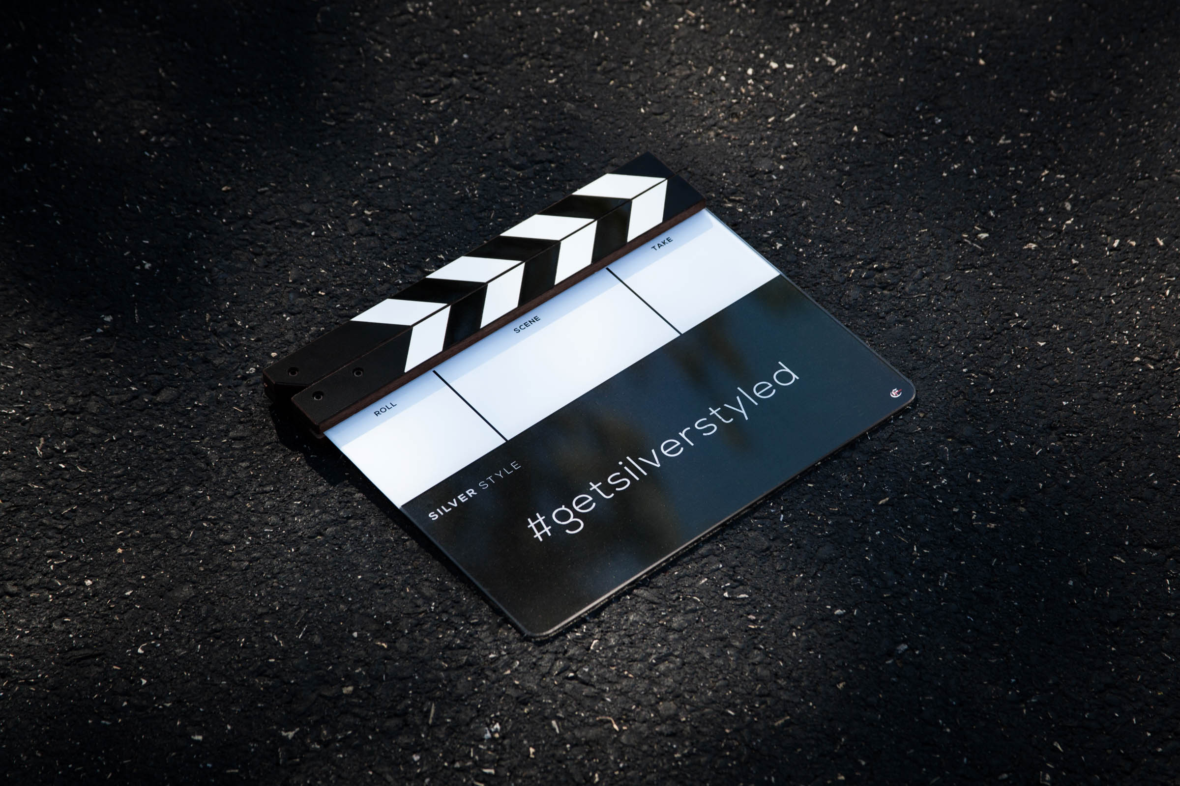 Custom film and video production clapperboard with Silver Style Pictures branding.